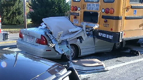 A School bus was hit from the rear. Note that the car went under the bus.
